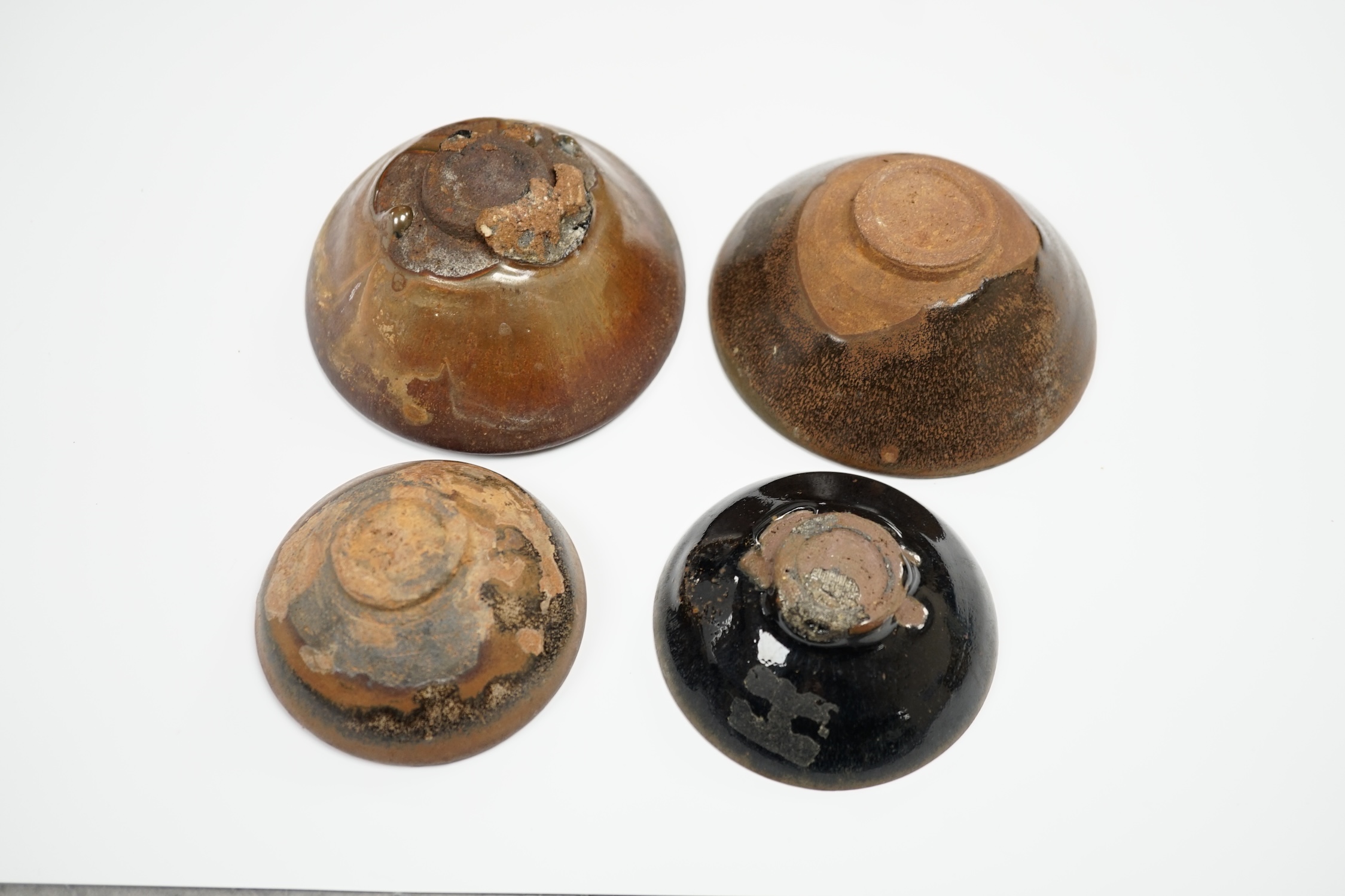 Four Chinese Jian ware bowls, Song dynasty, hare’s fur etc. largest 12cm in diameter